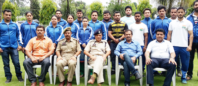 Selected players of State Power Lifting teams posing for a group photograph along with the dignitaries in Jammu on Friday.