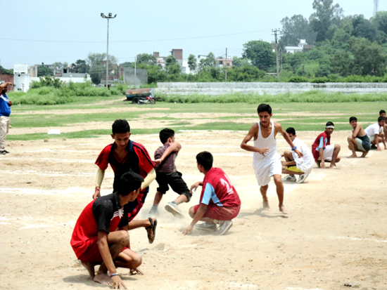 Players in action during a match of Under-19 Boys Kho-Kho Tournament in Samba.