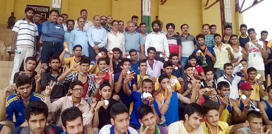 Winners posing for a group photograph alongwith Officers and Officials at MA Stadium in Jammu on Saturday.