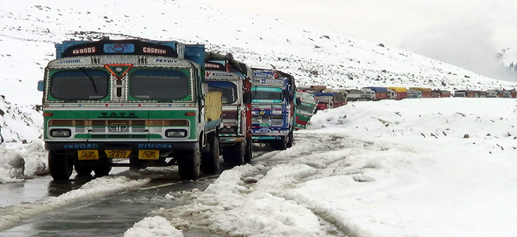 Trucks stranded at Dongimarg on Mughal Road. —Excelsior/Younis Khaliq