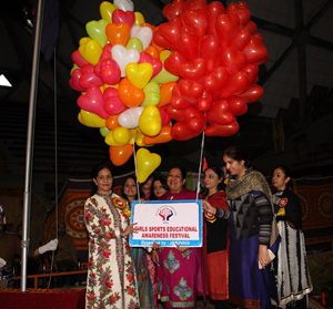 Chairperson PWWA, K Vijaya Rajendra releasing balloons while inaugurating girls sports festival in Srinagar.