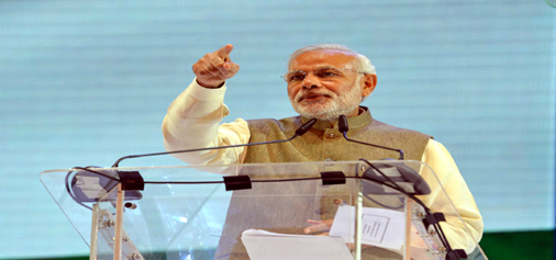 Prime Minister, Narendra Modi addressing the Indian diaspora in Kuala Lumpur, Malaysia on Sunday. (UNI)