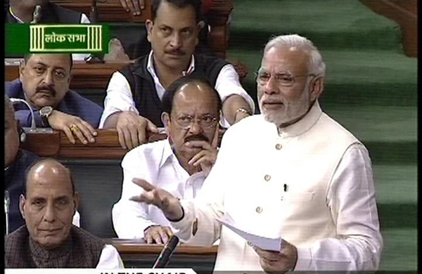 TV grab of Prime Minister Narendra Modi speaking in the Lok Sabha during the debate on "Commitment to the Constitution”, in New Delhi on Friday.(UNI)