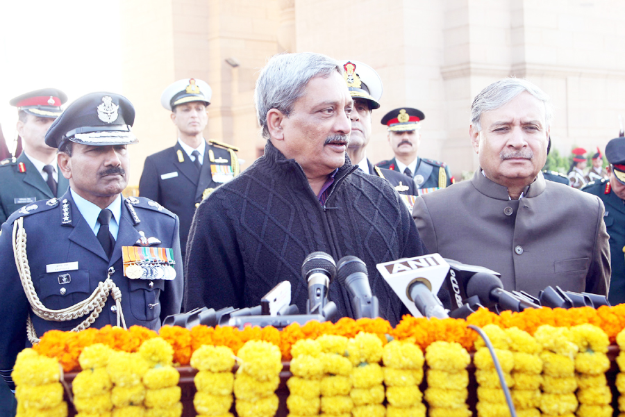 Union Minister for Defence, Manohar Parrikar interacting with the media after paying homage to the Martyrs of 1971 War, at Amar Jawan Jyoti, India Gate, to mark ‘Vijay Diwas’, in New Delhi on Wednesday.