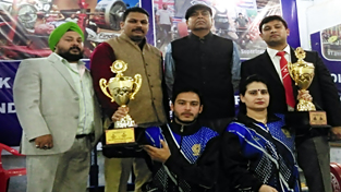 Powerman and Powerwoman posing for a group photograph alongwith dignitaries during valedictory function of Bench-Press & Deadlift Championship in Jammu on Sunday. Powerman and Powerwoman posing for a group photograph alongwith dignitaries during valedictory function of Bench-Press & Deadlift Championship in Jammu on Sunday.