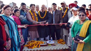 Senior BJP leader Yudhvir Sethi inaugurating lane at Rajiv Nagar on Sunday.