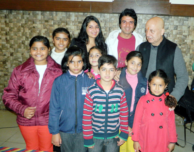 Cine star, Anupam Kher, posing with Star cast of ‘Nanhe Farishtey’ at Amar Singh Club in Jammu.