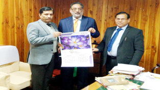 Finance Minister Haseeb Drabu unveiling calendar of J&K Grameen Bank for the year 2016.