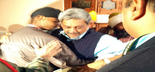 Defence Minister Manohar Parrikar at the residence of martyr Kulwant Singh in Pathankot on Tuesday. -Excelsior/Madan Magotra