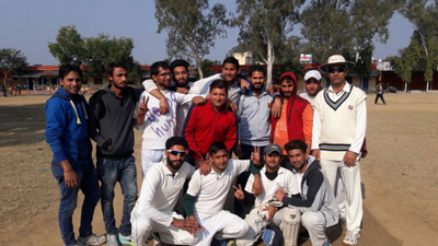 Winners NCC Akhnoor posing for a group photograph after sealing berth in the finals of New Year Cricket Cup at Akhnoor on Thursday.