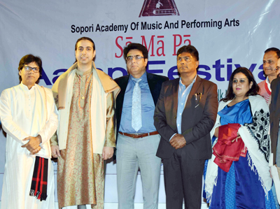 Star Santoor player, Abhay Rustam Sopori and Ragini posing along with the chief guest Kuldeep Khoda and guest of honour, SM Sahai and other dignitaries during Musical Concert in Jammu on Thursday.