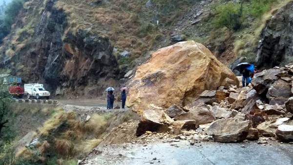 Landslides block Batote-Kishtwar highway at Koura Pani on Sunday. Another pic on page 15 — Excelsior/Tilak Raj