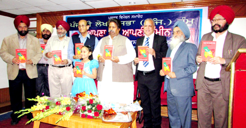 Former Minister Raman Bhalla and other dignitaries releasing a book during literary event organized by Punjabi Lekhak Sabha in Jammu. Former Minister Raman Bhalla and other dignitaries releasing a book during literary event organized by Punjabi Lekhak Sabha in Jammu.
