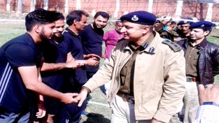 SSP Rajouri, Rajeshwar Singh interacting with players while inaugurating Volleyball Tournament on Saturday.