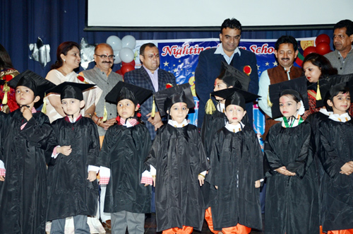 Students posing alongwith dignitaries during Annual Day celebration at Nightingale Pre-School in Jammu.
