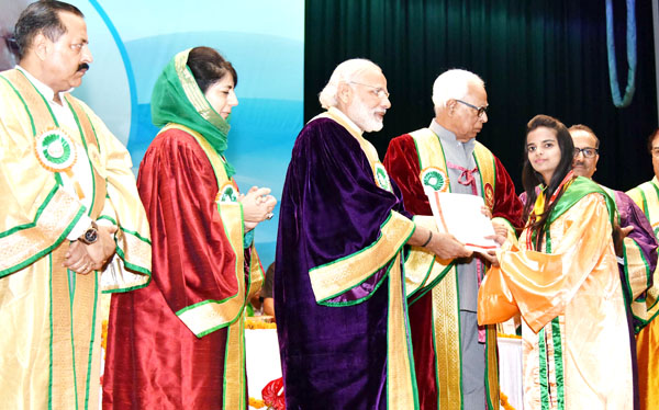 Prime Minister Narendra Modi distributing awards to students during 5th convocation of Shri Mata Vaishno Devi University at Katra on Tuesday. Excelsior / Rakesh