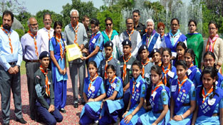 Governor alongwith other dignitories presenting Rajya Puraskar to Bharat Scouts and Guides at Raj Bhavan on Wednesday.