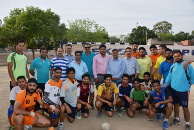 Selected State Handball teams posing for a group photograph alongwith dignitaries and officials.