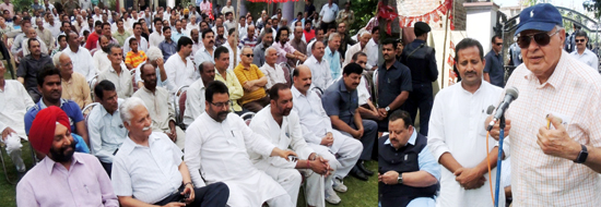 NC president Dr Farooq Abdullah addressing party workers at Paloura on Sunday.