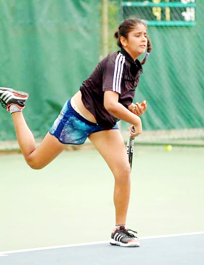 Prinkle playing a backhand shot during a quarterfinal match of AITA All India Ranking Tournament at Chandigarh.