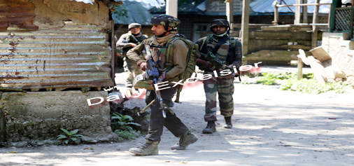Para commando in action at the site of encounter at Chack Drugmulla, Kupwara on Saturday - Photo : Aabid Nabi