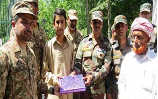 Mendhar school boy being handed over to the Army by Pak Rangers at Chakkan-da-Bagh in Poonch on Sunday.
