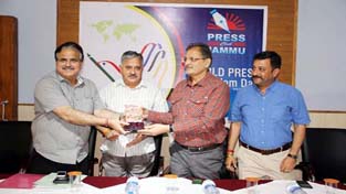Speaker Kavinder Gupta being presented a memento by PCJ during a function on World Press Freedom Day on Tuesday.