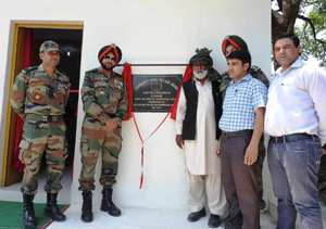 Brigade Commander handing over Community Centre to Sarpanch at Dehri in Mendhar on Thursday.