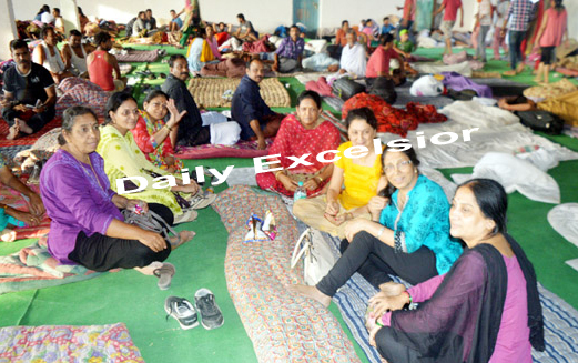 Amarnath yatris at base camp Qazigund in Anantnag district on Wednesday. Excelsior/Sajad Dar