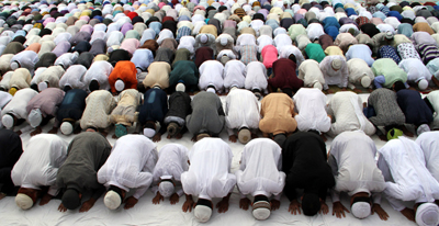 Muslims offering Eid Namaz at Jammu on Wednesday. -Excelsior/Rakesh