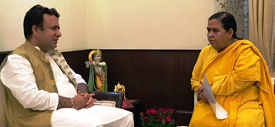 Minister for CAPD, Zulfkar Ali interacting with Union Minister for Water Resources, Uma Bharti at New Delhi on Saturday.