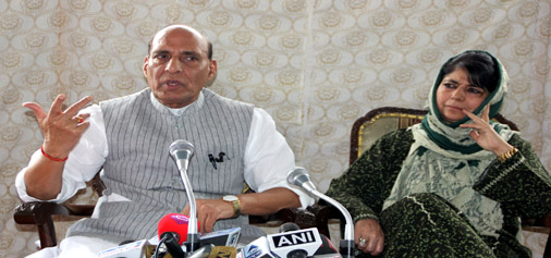 Home Minister Rajnath Singh along with Chief Minister Mehbooba Mufti addressing a press conference in Srinagar on Thursday. -Excelsior/ Shakeel