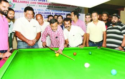 Joint Secretary, Sports Council, Shiv Kumar Sharma kick starting Billiard and Snooker Championship at Billiards Hall, MA Stadium in Jammu. —Excelsior/Rakesh