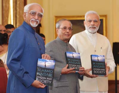 President Pranab Mukherjee with Vice President Mohd Hamid Ansari and Prime Minister Narendra Modi release a book 'Citizen and Society' authored by Mohd. Hamid Ansari at Rashtrapati Bhavan in New Delhi on Friday. (UNI)