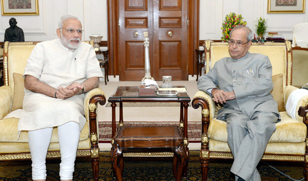 Prime Minister, Narendra Modi briefing President Pranab Mukherjee at Rashtrapati Bhavan in New Delhi on Monday.