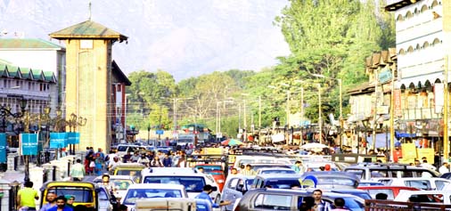 A view of traffic jam in Srinagar as shops and business establishments open in Srinagar on Sunday for the first time since July 9. -Excelsior/Shakeel
