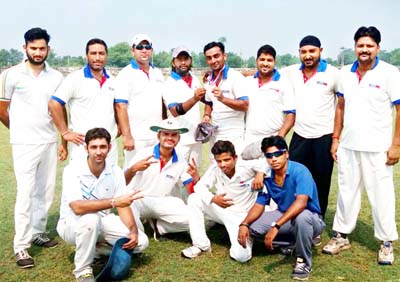 Winner Media XI team posing for a group photograph on Saturday.