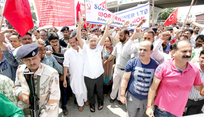 Employees taking out protest rally in Jammu on Friday. -Excelsior/ Rakesh