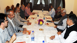Governor N N Vohra chairing a meeting at Srinagar on Wednesday.