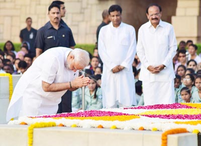 Prime Minister Narendra Modi paying tribute to Father of the Nation Mahatma Gandhi on his 147th Birth Anniversary at Rajghat, in New Delhi on Sunday. (UNI) Prime Minister Narendra Modi paying tribute to Father of the Nation Mahatma Gandhi on his 147th Birth Anniversary at Rajghat, in New Delhi on Sunday. (UNI)