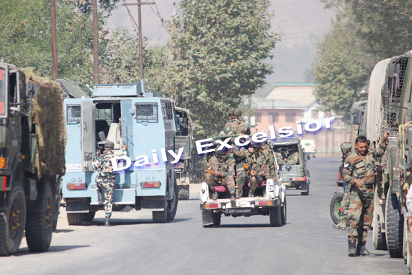 Security forces rush to JKEDI complex in Pampore, where gunbattle in on with militants : Excelsior Photo