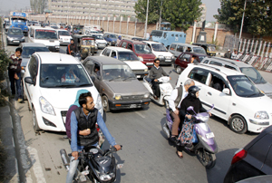 Srinagar streets witness heavy rush of private vehicles despite separatist shutdown on Monday. -Excelsior/Shakeel
