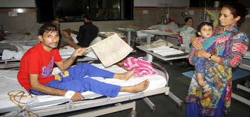 Patients and attendants suffering badly due to non-functioning of AC plants, in a ward at SSH, Jammu on Monday. -Excelsior/Rakesh Patients and attendants suffering badly due to non-functioning of AC plants, in a ward at SSH, Jammu on Monday. -Excelsior/Rakesh