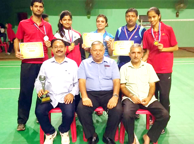 Medal winners posing for group photograph.