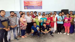Winners of District Open Table Tennis Championship posing for photograph after being awarded by former MLA Udhampur Balwant Singh Mankotia and others.