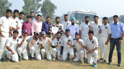 Triumphant cricket team of Govt SPMR College of Commerce posing for a group photograph alongwith the dignitaries after winning the Inter-College Cricket Tournament.