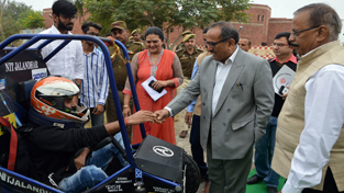 Deputy Chief Minister Dr Nirmal Singh interacting with a student depicting technological innovation of his project at GCET on Saturday.
