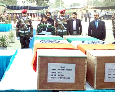 Chief Minister, Mehbooba Mufti laying wreath on mortal remains of martyrs on Wednesday.