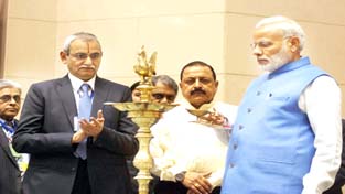 Prime Minister Narendra Modi with Union Minister Dr Jitendra Singh and CVC K V Chowdhry lighting the ceremonial lamp during the valedictory function of vigilance Awareness Week-2016, in New Delhi on Monday.(UNI)