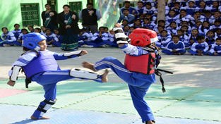 Players fighting for the top honours during Sports cum Athletic Meet at Humanity Public School.